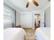Clean bedroom with two twin beds and large closets at 16 Hillside Dr, New Smyrna Beach, FL 32169