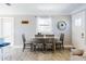 Comfortable dining area adjacent to the living area offers a bright and inviting space at 16 Hillside Dr, New Smyrna Beach, FL 32169