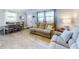 Inviting living area featuring cozy seating, natural light, and stylish decor at 16 Hillside Dr, New Smyrna Beach, FL 32169