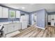Bright kitchen with modern appliances, ample counter space, and convenient access to a bathroom at 1663 Hideaway Ln, Edgewater, FL 32132
