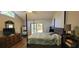 Serene main bedroom with sliding glass doors to the backyard, offering a tranquil retreat at 171 Fox Glen Ct, Ormond Beach, FL 32174