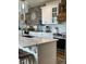 Well-equipped kitchen with a large island, stainless steel appliances, and ample counter space at 181 Caryota Ct, New Smyrna Beach, FL 32168