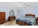 Bedroom with wood-look floors and ample natural light at 1855 Pine Tree Dr, Edgewater, FL 32141