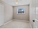Bedroom featuring tile floors and a ceiling fan at 1868 Pine Tree Dr, Edgewater, FL 32141