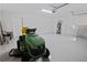 Garage featuring overhead lighting and equipment at 1868 Pine Tree Dr, Edgewater, FL 32141