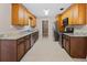 Well-appointed kitchen featuring stainless steel appliances, granite countertops, and ample cabinet space at 1868 Pine Tree Dr, Edgewater, FL 32141