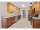 Modern kitchen boasts granite countertops, stainless steel appliances, and generous cabinet space for storage at 1868 Pine Tree Dr, Edgewater, FL 32141