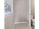 Walk-in closet with a window and closet shelving at 1868 Pine Tree Dr, Edgewater, FL 32141