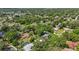 Sprawling neighborhood featuring tree-lined streets, single-Gathering homes, and private pools at 1905 Pine Tree Dr, Edgewater, FL 32141