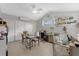 Brightly lit room features plenty of workspace with multiple sewing machines and storage space at 1905 Pine Tree Dr, Edgewater, FL 32141