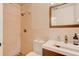Bathroom featuring neutral tiling, modern fixtures, and a glass-door shower at 1918 Whisperwood Way # 10, Port Orange, FL 32128