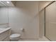 The bathroom features tile floors, a shower with glass door, toilet, and vanity with a quartz countertop at 1918 Whisperwood Way # 10, Port Orange, FL 32128