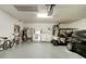 Spacious garage with laundry, utility sink, car, and golf cart parking at 1918 Whisperwood Way # 10, Port Orange, FL 32128