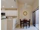Eat-in kitchen area with natural light, modern fixtures, and direct access to outdoor area at 1918 Whisperwood Way # 10, Port Orange, FL 32128