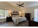 Comfortable main bedroom with vaulted ceilings, a ceiling fan, and neutral decor at 1918 Whisperwood Way # 10, Port Orange, FL 32128