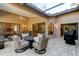 Covered patio featuring outdoor dining set and comfortable seating arrangement at 1918 Whisperwood Way # 10, Port Orange, FL 32128