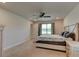 Bedroom featuring neutral decor and a window providing natural light at 208 Lagoon Mist Ct, Oak Hill, FL 32759
