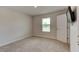 Bedroom with a window and ample natural light at 208 Lagoon Mist Ct, Oak Hill, FL 32759