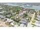 Aerial view of neighborhood homes, and proximity to the fishing pier at 212 Due East St, New Smyrna Beach, FL 32169