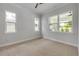 Bright bedroom with large windows offering ample natural light at 212 Due East St, New Smyrna Beach, FL 32169