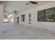 Covered patio with tile flooring providing a great space for outdoor entertainment and relaxation at 212 Due East St, New Smyrna Beach, FL 32169