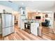 Modern kitchen with stainless steel appliances and white cabinets at 2236 Davis Dr, New Smyrna Beach, FL 32168