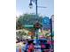 Street view showcases the historic business district with street sign and lovely flower basket at 2236 Davis Dr, New Smyrna Beach, FL 32168