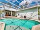 Backyard showcasing lanai, covered patio, pool, and outdoor shower area at 2656 Old Smyrna Trl, New Smyrna Beach, FL 32168