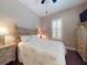 Bedroom with decorative furnishings and hardwood floors at 2656 Old Smyrna Trl, New Smyrna Beach, FL 32168