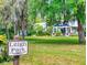 Charming houses in Leigh Park community with mature trees, landscaping, and curb appeal at 2656 Old Smyrna Trl, New Smyrna Beach, FL 32168