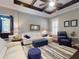 Comfortable living room features modern furniture and a stylish area rug at 2656 Old Smyrna Trl, New Smyrna Beach, FL 32168