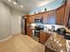 Well-equipped kitchen with stainless steel appliances, granite countertops, and ample cabinet space at 2801 S Ridgewood Ave # 512, South Daytona, FL 32119