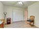 Bedroom with a neutral color palette, tile flooring, and built in closets at 2914 Sabal Palm Dr, Edgewater, FL 32141