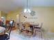 Spacious dining room with stylish decor and tile flooring, adjacent to the living area at 3013 Lime Tree Dr, Edgewater, FL 32141