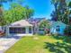 Charming one-story home with well-maintained landscaping, a two-car garage, and a beautiful front yard at 3013 Lime Tree Dr, Edgewater, FL 32141