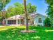 Charming single-story home with a well-manicured lawn and colorful landscaping in a desirable neighborhood at 3013 Lime Tree Dr, Edgewater, FL 32141
