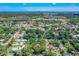 A high angle aerial view of a residential community with trees at 3016 Mango Tree Dr, Edgewater, FL 32141