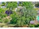 Aerial view of a home's lot surrounded by mature trees at 3016 Mango Tree Dr, Edgewater, FL 32141