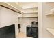 Spacious walk-in closet with shelving and hanging storage and room for a desk and filing cabinet at 3016 Mango Tree Dr, Edgewater, FL 32141