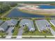 Beautiful aerial shot highlighting the home's location with nearby ponds and surrounding community at 3219 Modena Way, New Smyrna Beach, FL 32168
