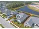 Aerial view showcasing the home's location and highlights the expansive outdoor area and landscaping at 3219 Modena Way, New Smyrna Beach, FL 32168