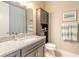 Bathroom features a granite countertop vanity and a walk-in shower at 3219 Modena Way, New Smyrna Beach, FL 32168