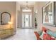 Bright foyer featuring tile flooring, chandelier, and furniture at 3219 Modena Way, New Smyrna Beach, FL 32168