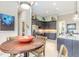 This is a spacious kitchen with stainless steel appliances, modern cabinetry, and beautiful granite countertops at 3219 Modena Way, New Smyrna Beach, FL 32168