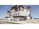 Well-maintained three-story condo featuring a balcony, modern finishes, an attached garage and a front entrance at 3403 S Atlantic Ave # 3, New Smyrna Beach, FL 32169