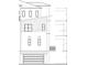 Side elevation of a modern home with a two-car garage and ample windows at 3403 S Atlantic Ave # 3, New Smyrna Beach, FL 32169