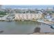 A condo building with a pool, docks, and stunning ocean views at 3606 S Peninsula Dr # 509, Port Orange, FL 32127