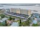 Aerial view of the Admiralty Club condo building with covered parking and beautiful waterfront views at 3606 S Peninsula Dr # 509, Port Orange, FL 32127