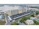 Aerial view showing Admiralty Club condo complex near the water, surrounding neighborhood, and covered parking at 3606 S Peninsula Dr # 509, Port Orange, FL 32127