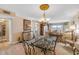 Open concept dining and living room with waterfront views at 3606 S Peninsula Dr # 509, Port Orange, FL 32127